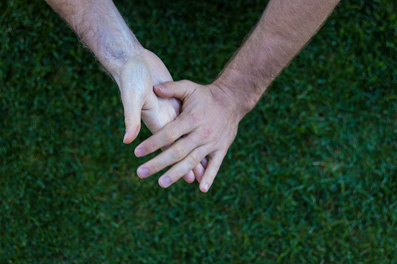 Rubbing AcroGrip onto your hands